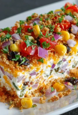 Cowboy Caviar Jalapeno Popper Cheese Log topped with fresh ingredients