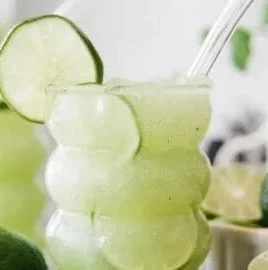 Refreshing Crazy Limeade Slush drink in a colorful cup