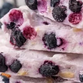 Frozen yogurt bark topped with fresh blueberries and crunchy almonds