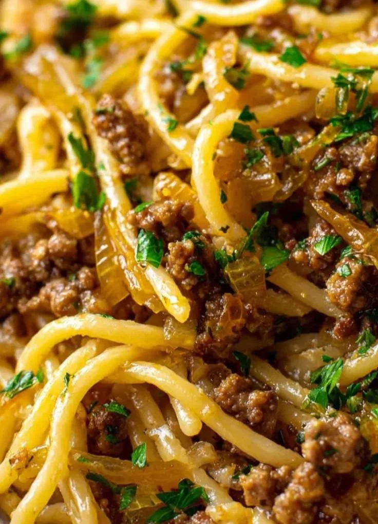 Delicious garlic butter beef pasta served in a bowl.