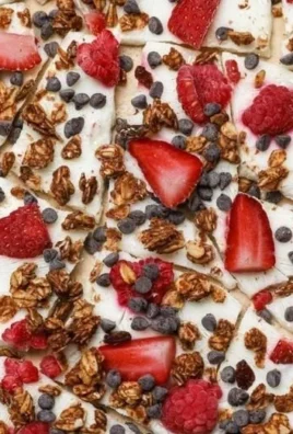 Homemade Greek Yogurt Bark topped with fruits and nuts