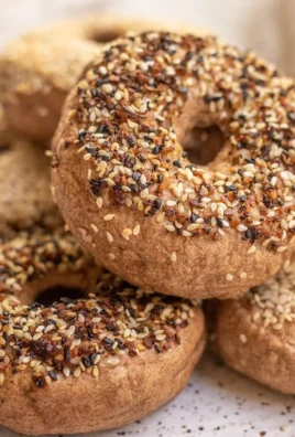 Plate of high protein bagels with toppings