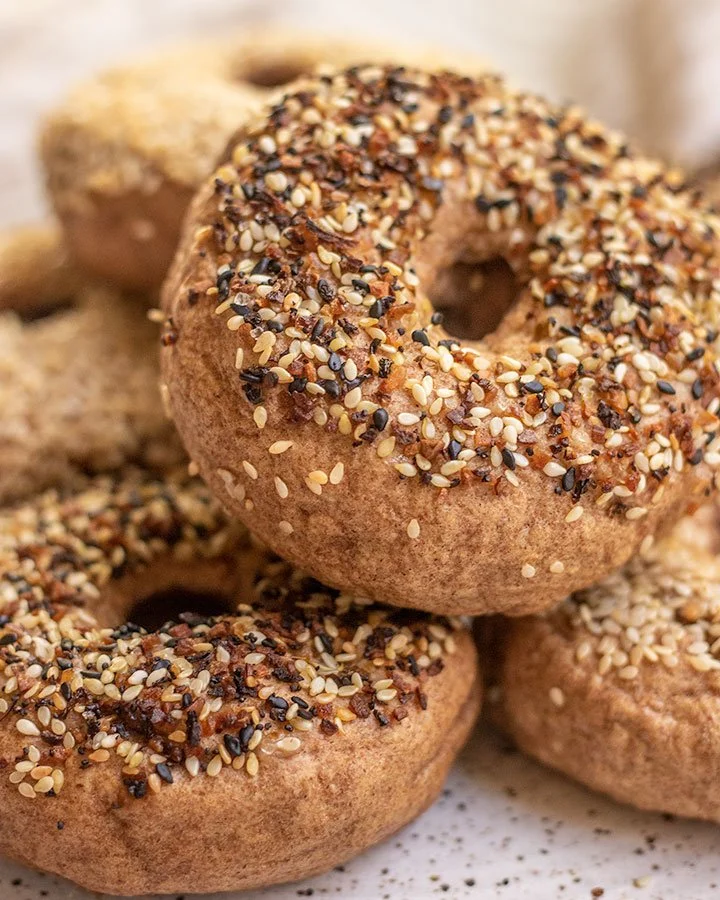 Plate of high protein bagels with toppings