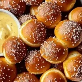 Homemade pretzel bites served warm with dipping sauces for a cozy night