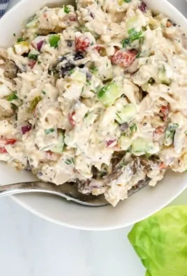 Colorful Mediterranean Chicken Salad with fresh ingredients and herbs