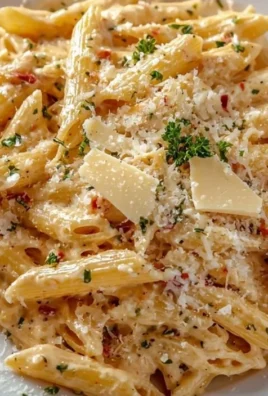 One pot creamy garlic pasta dish with fresh herbs and parmesan cheese