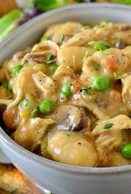 One pot gnocchi chicken pot pie with vegetables and herbs.