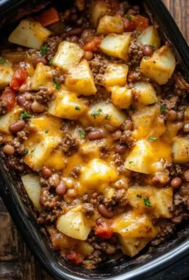 Delicious Slow Cooker Cowboy Casserole served in a rustic bowl