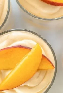 Summer Peach Mousse Trifles dessert in clear glass cups