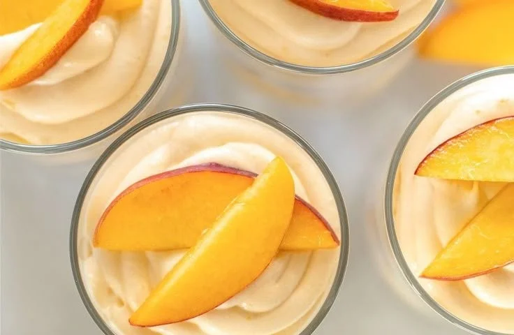 Summer Peach Mousse Trifles dessert in clear glass cups
