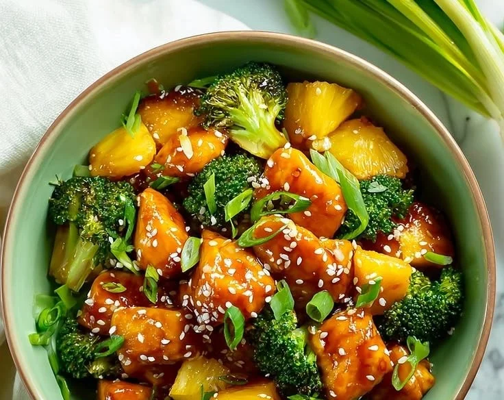 Teriyaki Sheet Pan Pineapple Chicken with Broccoli on a table